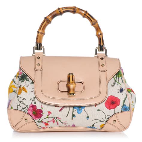 gucci lausanne|Gucci floral handbags.